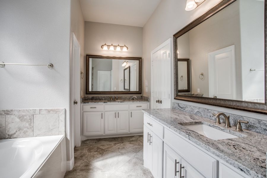Representative furnished interior of a home built from the Burlington II by Megatel Homes in Santorini, Seagoville (Image 4).
