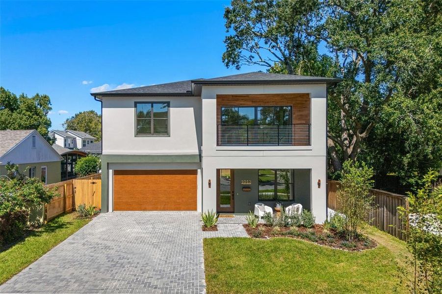 Front exterior of a new home in , Orlando, FL, highlighting curb appeal (Image 29).