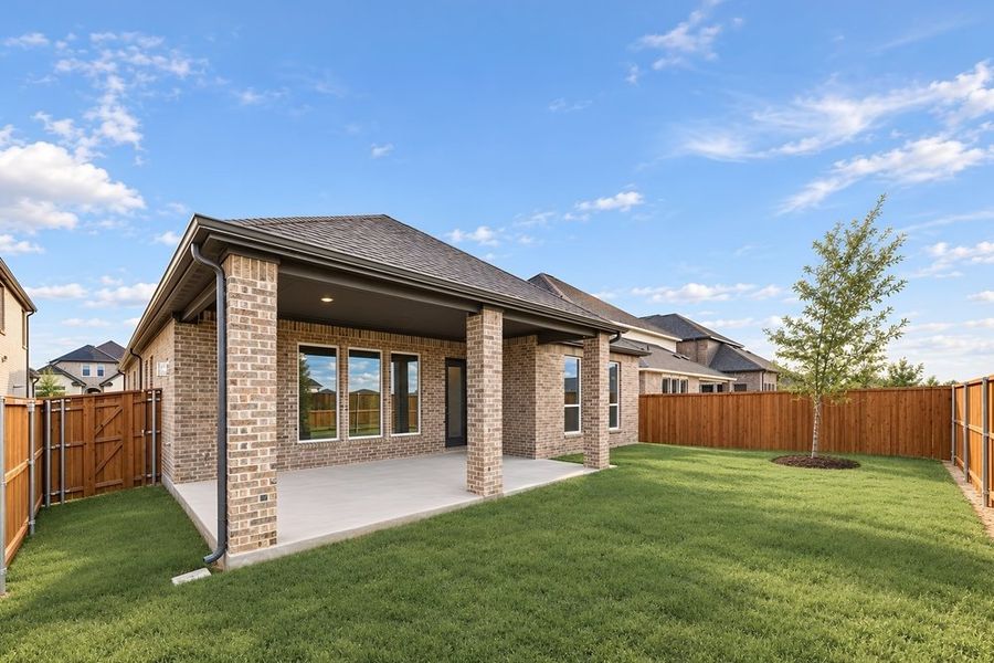 Exterior details and patio area of a home in South Oak, Lakewood Village (Image 4).