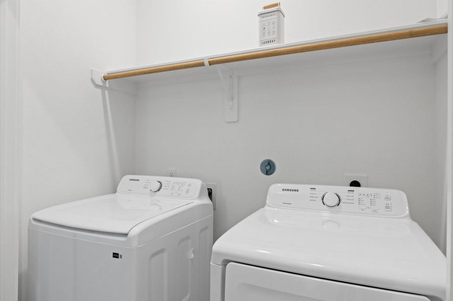 Conveniently located on the second floor, this well-designed laundry room offers both functionality and style. Conveniently located on the second floor, this well-designed laundry room offers both functionality and style.