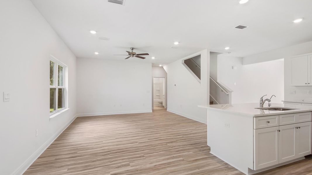 Representative unfurnished interior of a home built from the Carol by D.R. Horton in Holley Grove at Peach Creek, Santa Rosa Beach (Image 13).