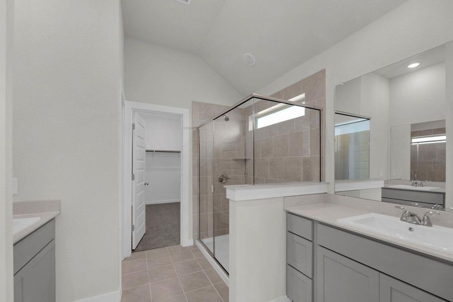 Primary Bathroom in the Pecos home plan by Trophy Signature Homes – REPRESENTATIVE PHOTO