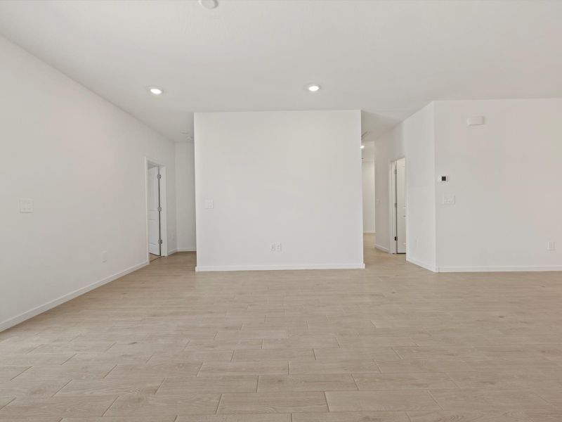 Spacious, unfurnished interior of a new home in Rancho Mirage Estate Series, Maricopa (Image 8).
