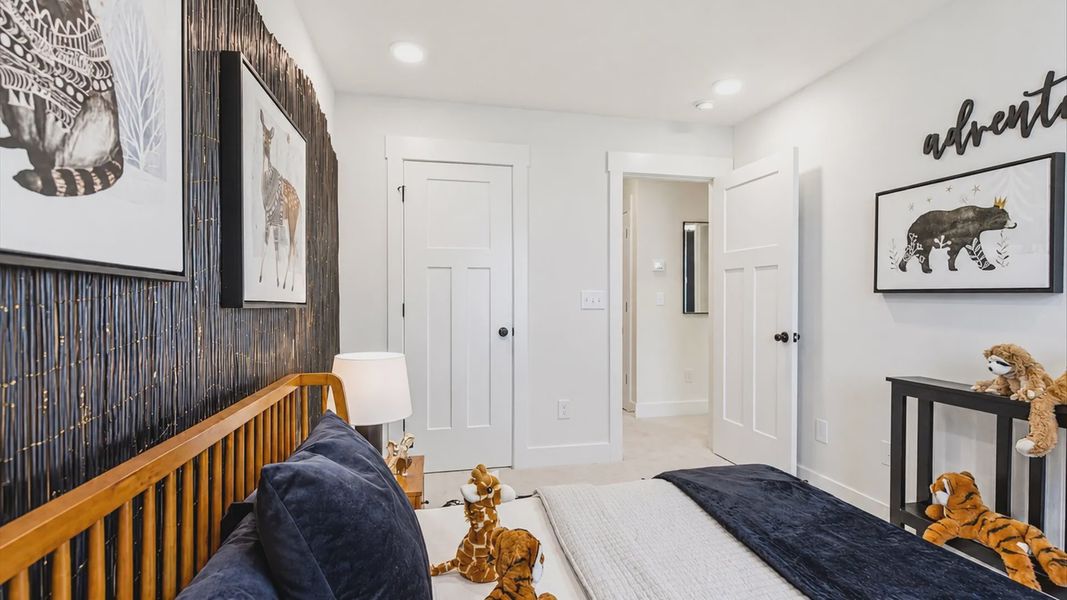 Memorable space offering plush carpet underfoot and a thoughtfully planned walk-in closet at the Churchill Design