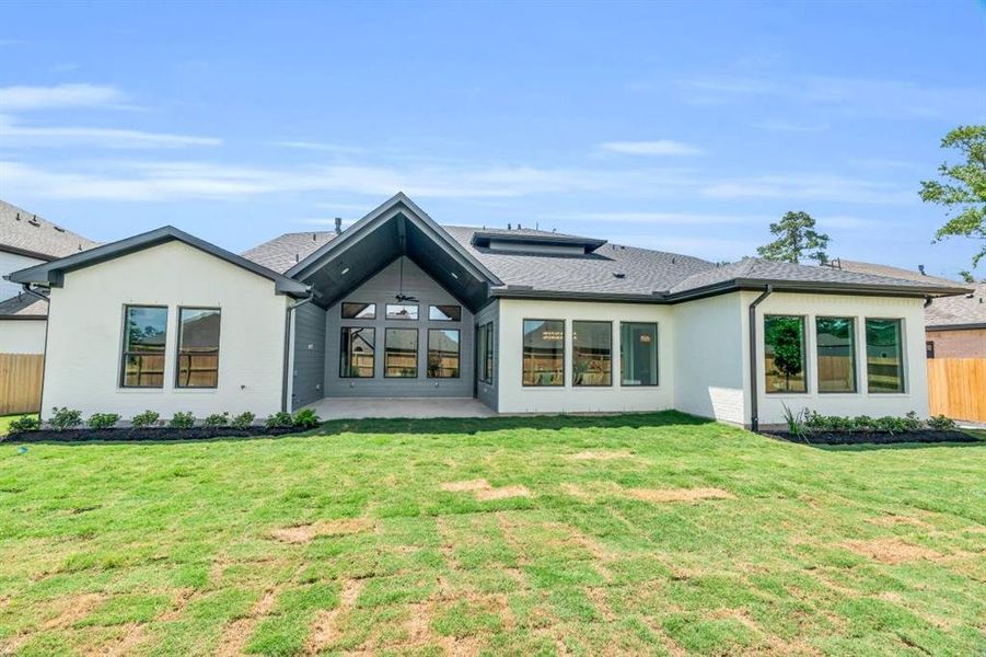 The back yard has plenty of room for a pool and more!