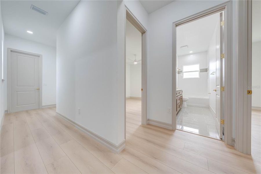 Hallway to other Bedrooms and Bath