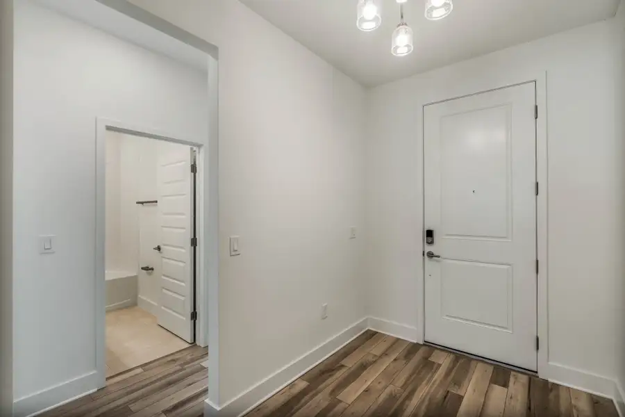 Spacious, unfurnished interior of a new home in Harvest at Ovation - Townhomes, Winter Garden (Image 15).