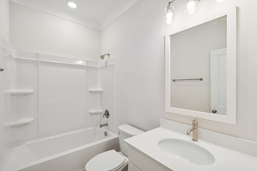 Furnished interior view inside a new home in Hidden Ponds Reserve, Awendaw (Image 6).