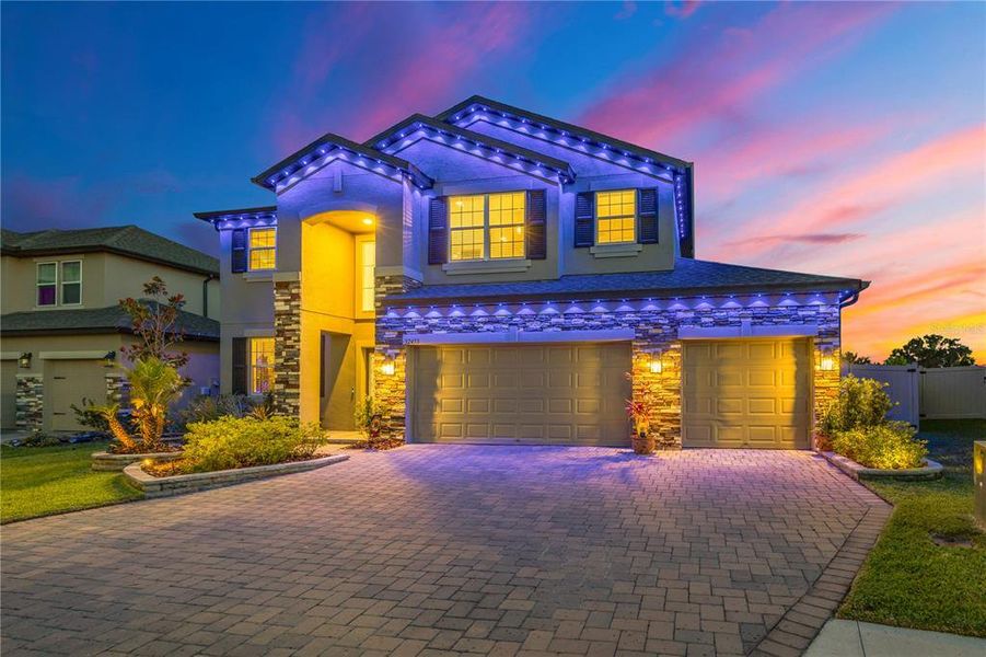 Front exterior of a new home in , Wesley Chapel, FL, highlighting curb appeal (Image 24).