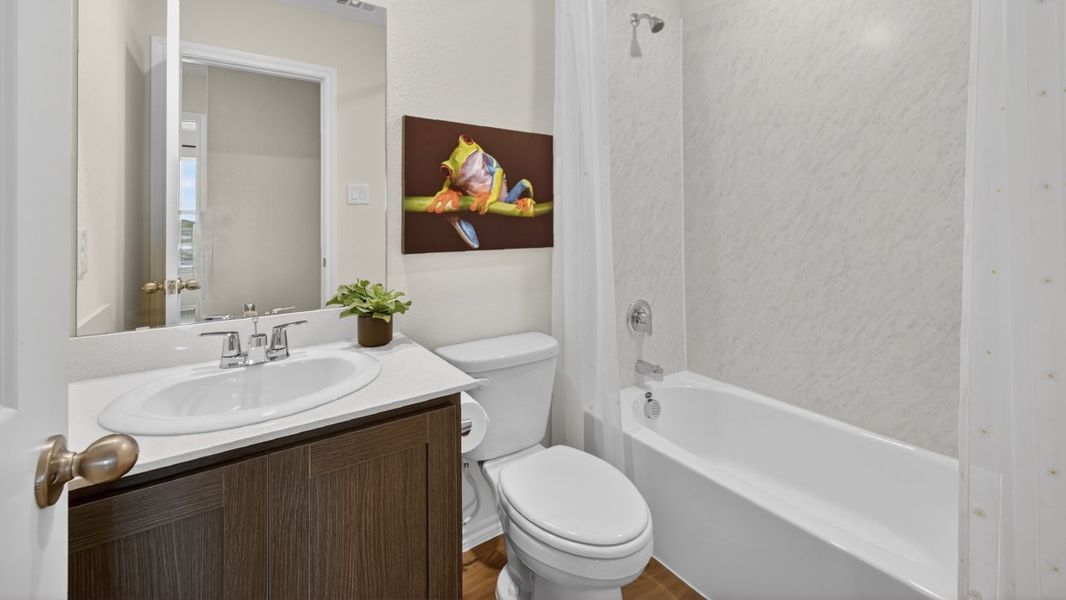 Representative furnished interior of a home built from the Atlanta by D.R. Horton in The Hills of Sherman, Sherman (Image 18).