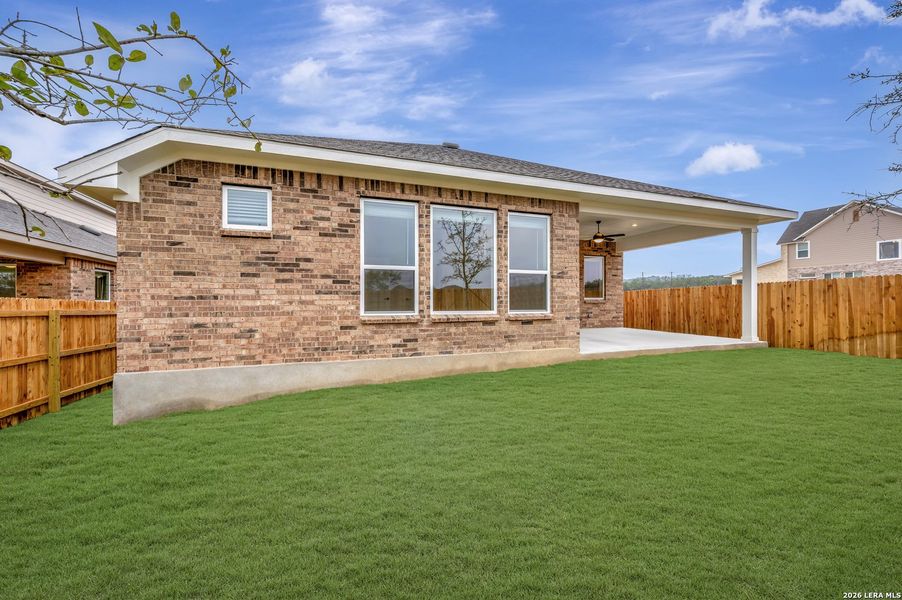 Exterior details and patio area of a home in Davis Ranch 50', San Antonio (Image 22).