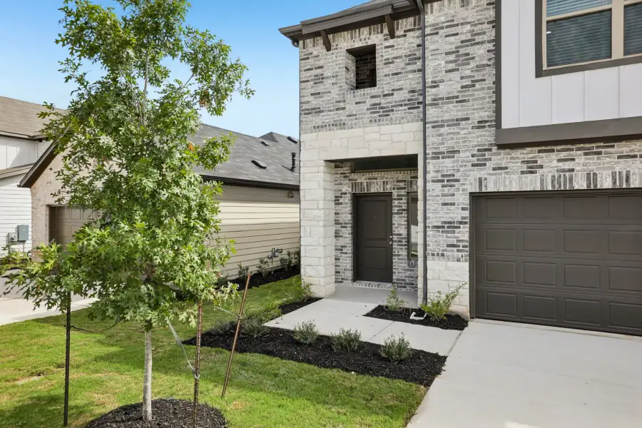 Exterior details and patio area of a home in Trinity Ranch, Elgin (Image 3).