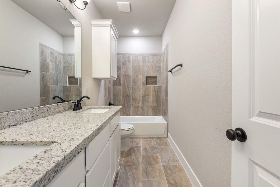 Furnished interior view inside a new home in , College Station (Image 16).