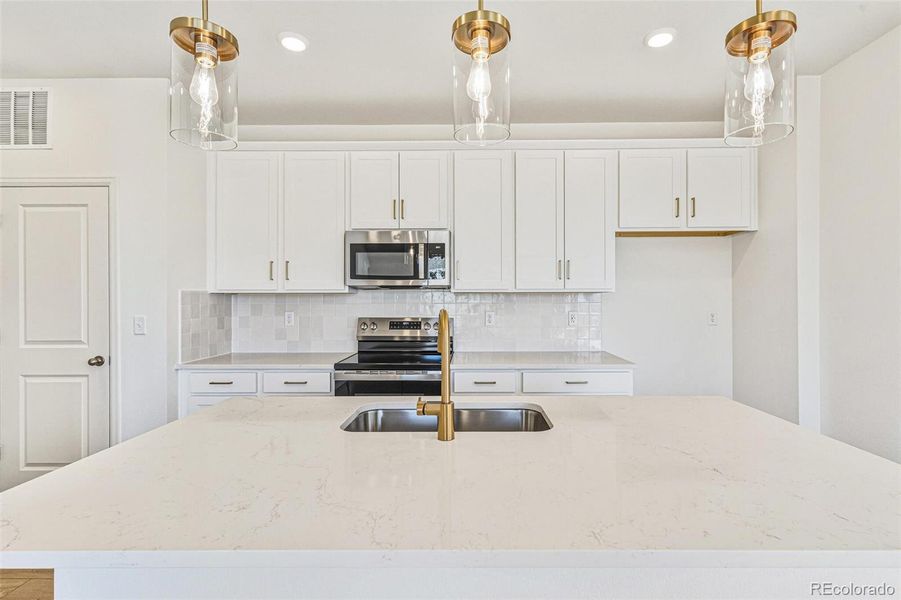 Furnished interior view inside a new home in Turnberry Villas, Commerce City (Image 5).