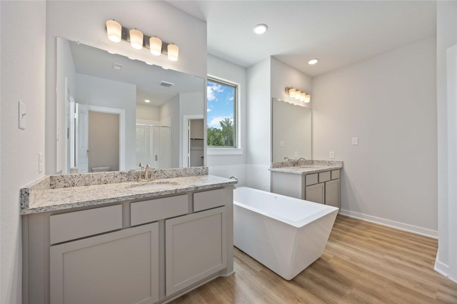 A dreamy retreat: enjoy spa-level comfort with a freestanding tub and serene atmosphere. A dreamy retreat: enjoy spa-level comfort with a freestanding tub and serene atmosphere.