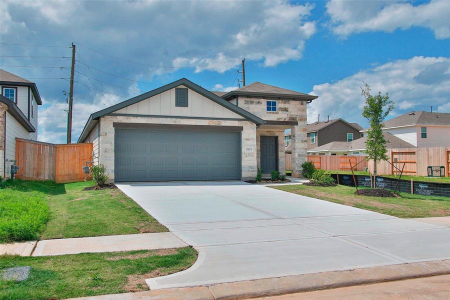 Front exterior of a home in the Colony at Pinehurst community, located in Pinehurst, TX (Image 10).