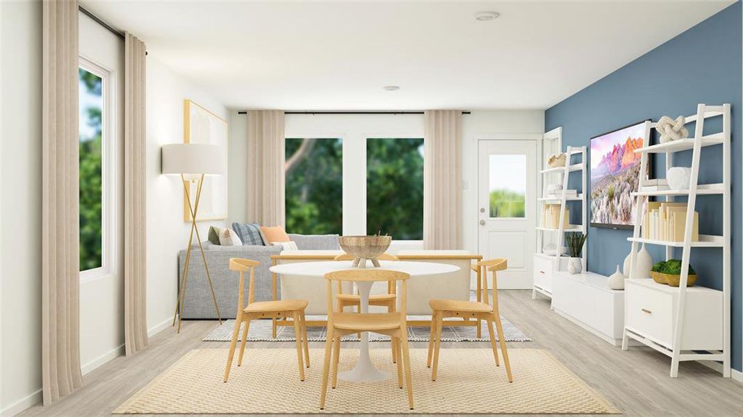 Dining space featuring light hardwood / wood-style flooring and a healthy amount of sunlight