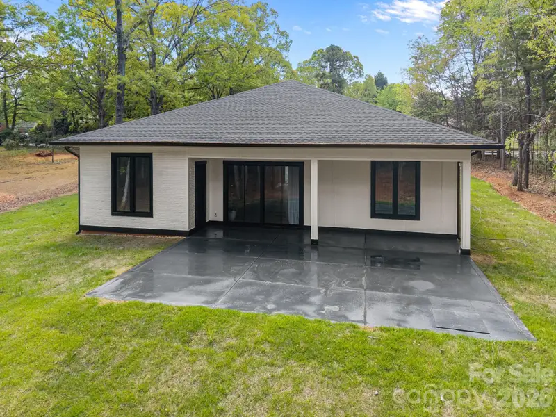 Exterior details and patio area of a home in , Charlotte (Image 26).