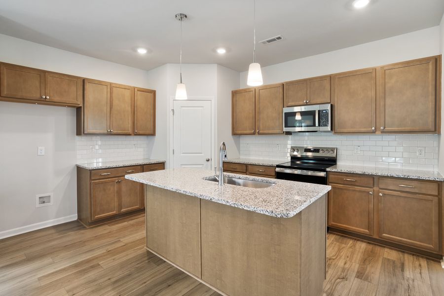 Furnished interior view inside a new home in Cambridge Reserve, Angier (Image 8).