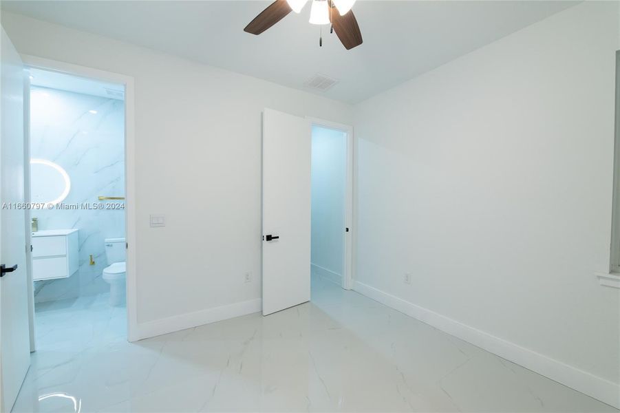 Furnished interior view inside a new home in , Cape Coral (Image 29).