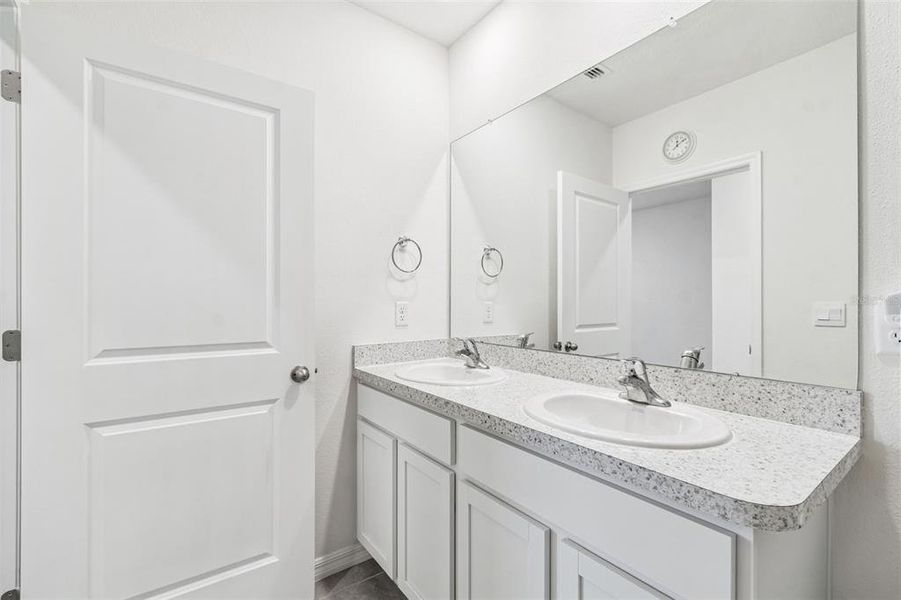 Furnished interior view inside a new home in Westgate at Avalon Park, Wesley Chapel (Image 48).