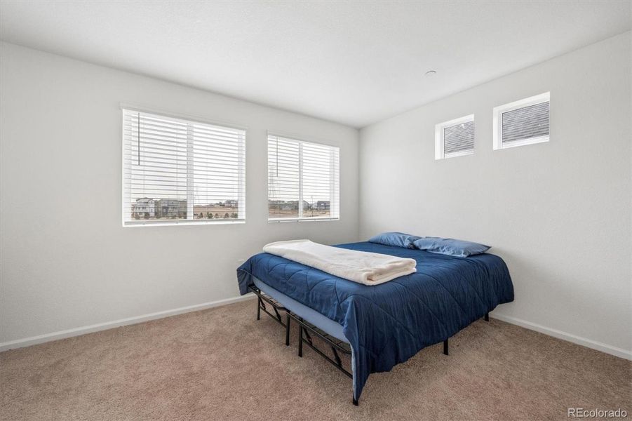 Furnished interior view inside a new home in Reunion, Commerce City (Image 10).