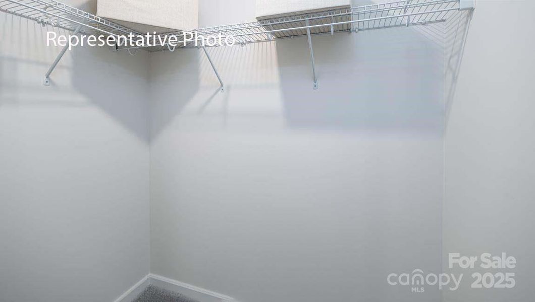 Spacious, unfurnished interior of a new home in Sanctuary at Southgate, Indian Trail (Image 19).