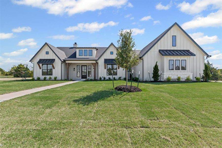 Front exterior of a new home in , Caddo Mills, TX, highlighting curb appeal (Image 19).