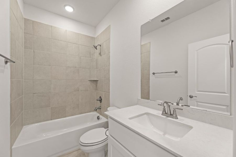 Representative furnished interior of a home built from the Chisholm by UnionMain Homes in Reunion, Rhome (Image 6).