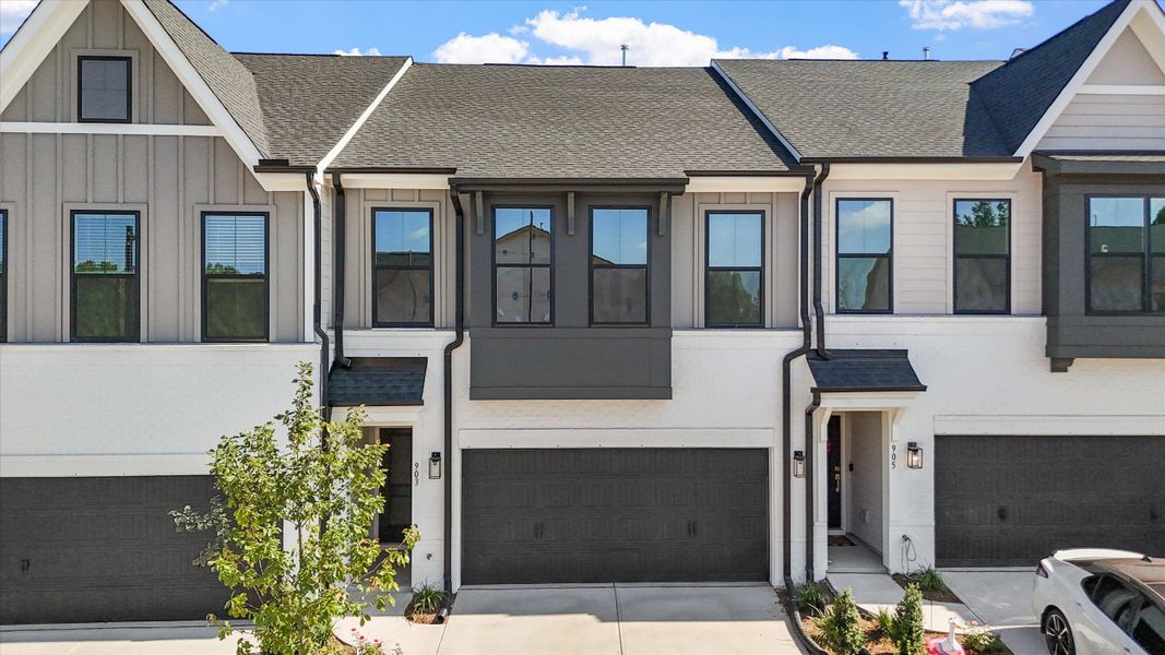 Front exterior of a new home in Sweetbrier, Durham, NC, highlighting curb appeal (Image 14).