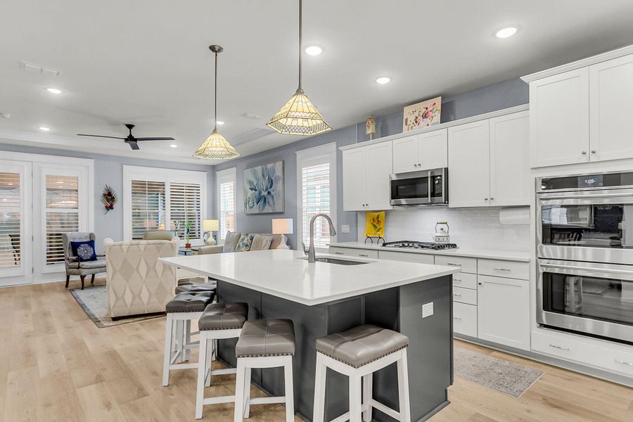 Furnished interior view inside a new home in K. Hovnanian's® Four Seasons at Lakes of Cane Bay, Summerville (Image 33).