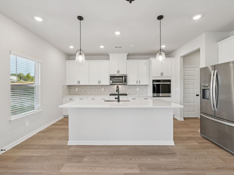 The Taylorsville floorplan with the Divine White interior package.