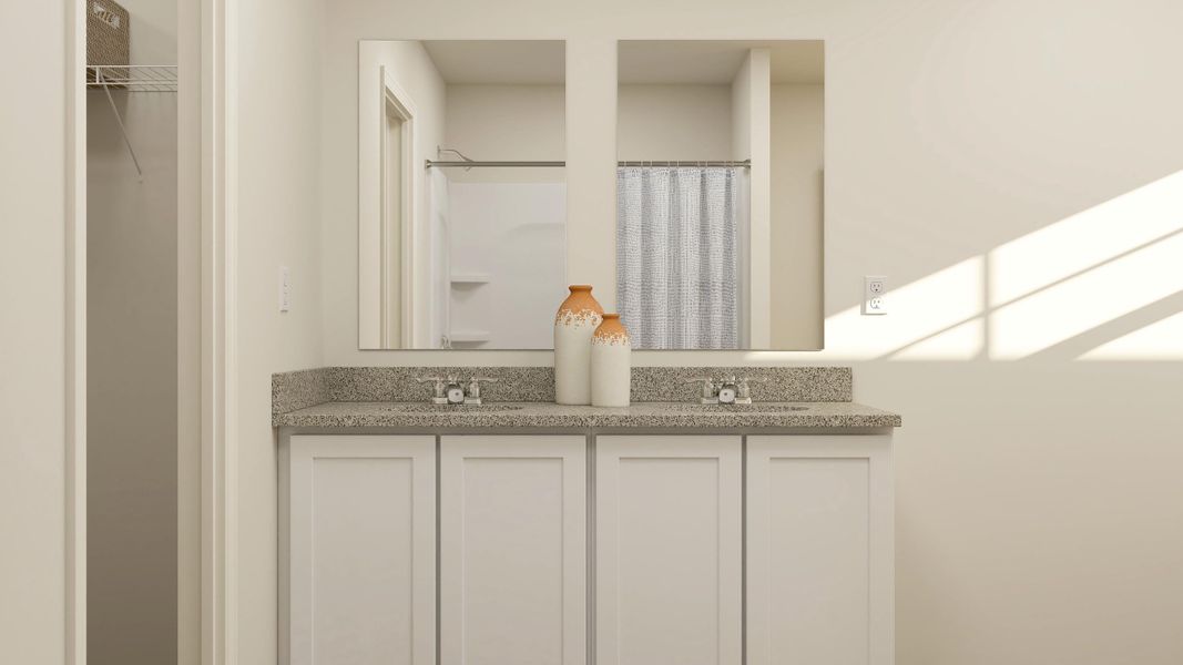 A bathroom with a marble countertop.