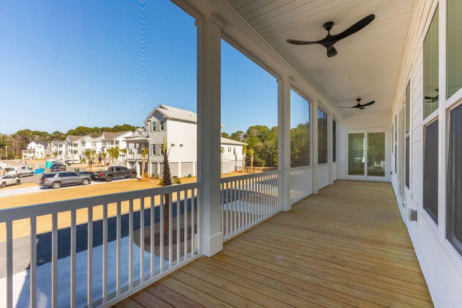 Exterior details and patio area of a home in Overlook at Copahee Sound, Awendaw (Image 34).