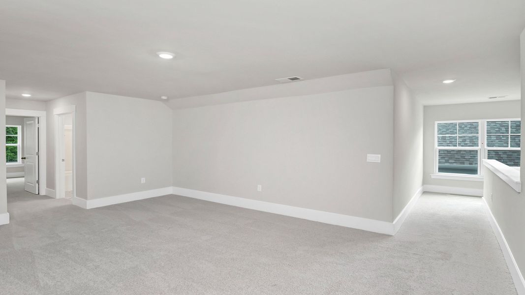 Spacious, unfurnished interior of a new home in Lake Tide Summit, Chapin (Image 26).