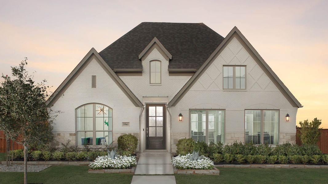 Front exterior of a new home in Meadows of Mill Creek, Seguin, TX, highlighting curb appeal (Image 21).