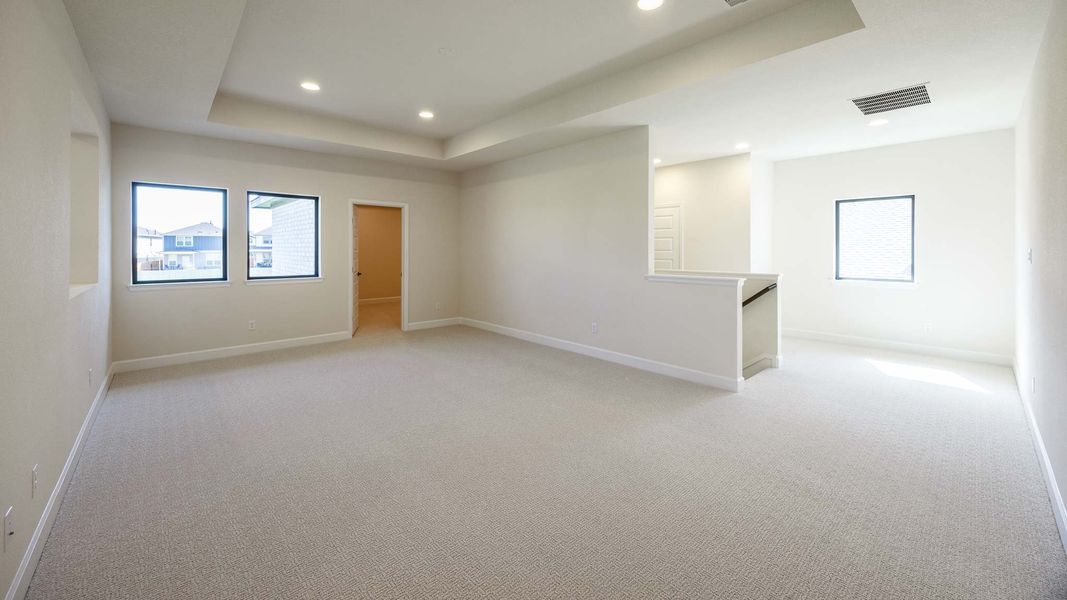 Spacious, unfurnished interior of a new home in Santa Rita Ranch - Tierra Rosa, Liberty Hill (Image 18).