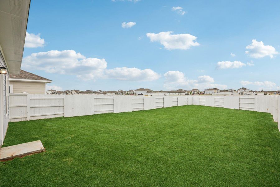 Exterior details and patio area of a home in Harvest Ridge, Elgin (Image 22).