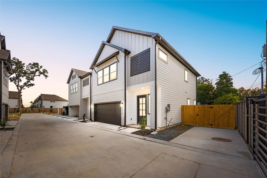 Pictured here is the side gate to the fenced in yard space.