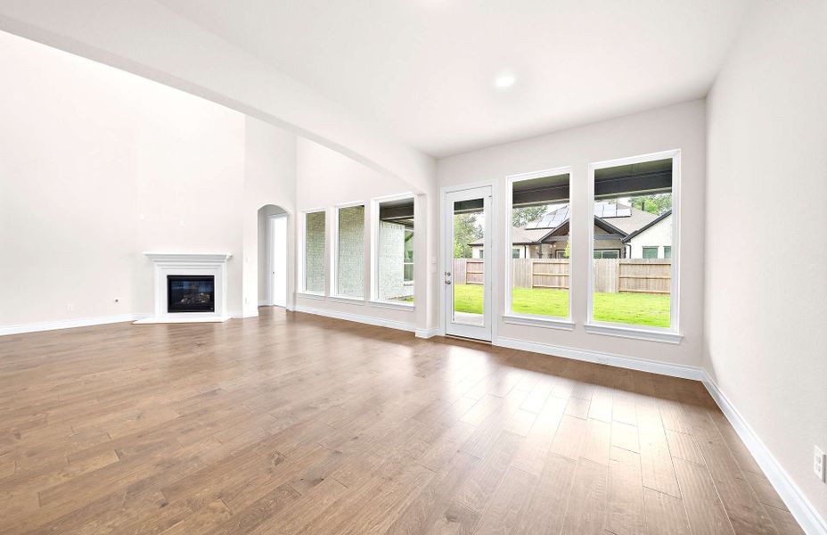 Representative unfurnished interior of a home built from the 4094 by Ravenna Homes in Artavia 70′, Conroe (Image 23).