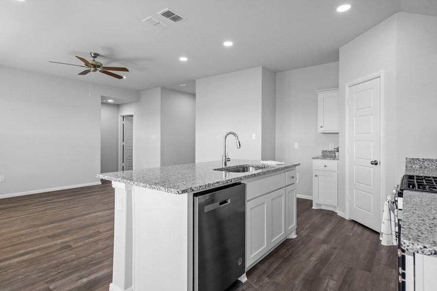 Representative furnished interior of a home built from the BELLVUE by D.R. Horton in Faculty Row, Abilene (Image 11).
