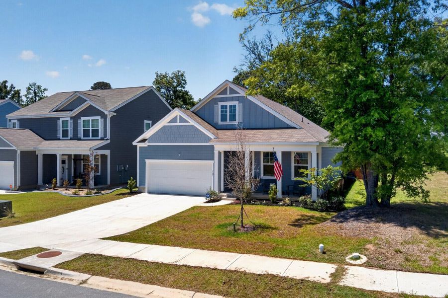Front exterior of a new home in , Moncks Corner, SC, highlighting curb appeal (Image 2). Front exterior of a new home in , Moncks Corner, SC, highlighting curb appeal (Image 2).