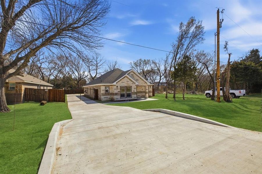 Front exterior of a new home in , Glenn Heights, TX, highlighting curb appeal (Image 23). Front exterior of a new home in , Glenn Heights, TX, highlighting curb appeal (Image 23).