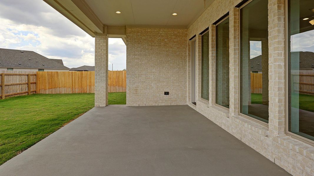 Exterior details and patio area of a home in Alsatian Oaks 50', Castroville (Image 3).