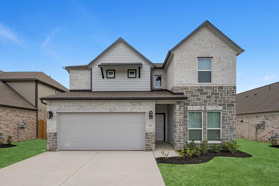 Front exterior of a new home in Barton Creek Ranch, Conroe, TX, highlighting curb appeal (Image 2). Front exterior of a new home in Barton Creek Ranch, Conroe, TX, highlighting curb appeal (Image 2).