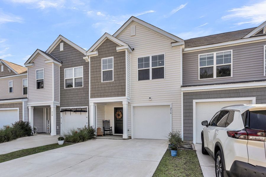 Front exterior of a new home in , Summerville, SC, highlighting curb appeal (Image 1).