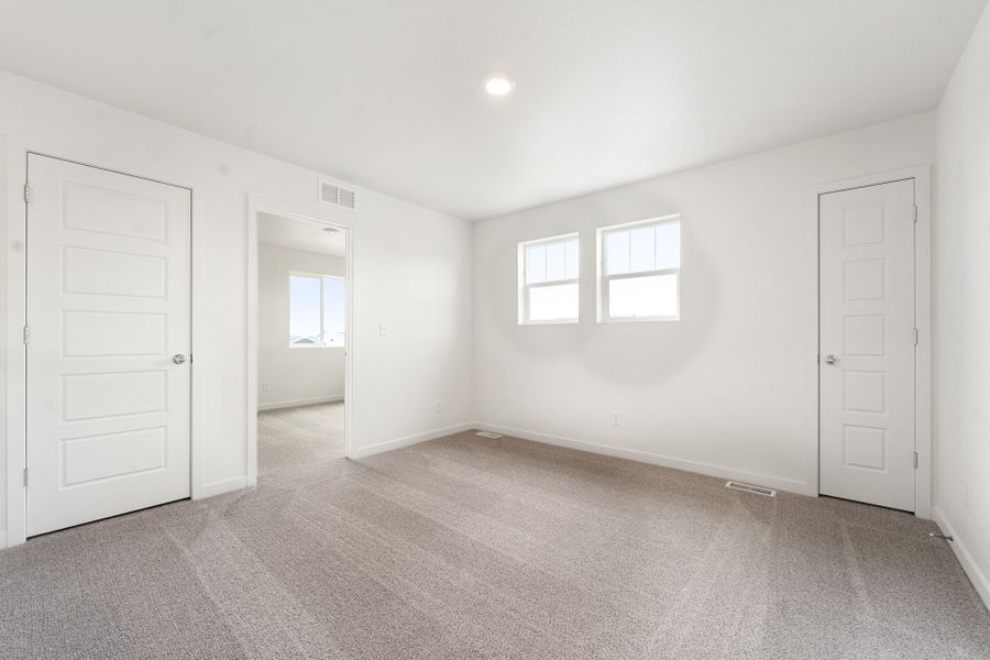 Spacious, unfurnished interior of a new home in Union Colony West, Greeley (Image 22).