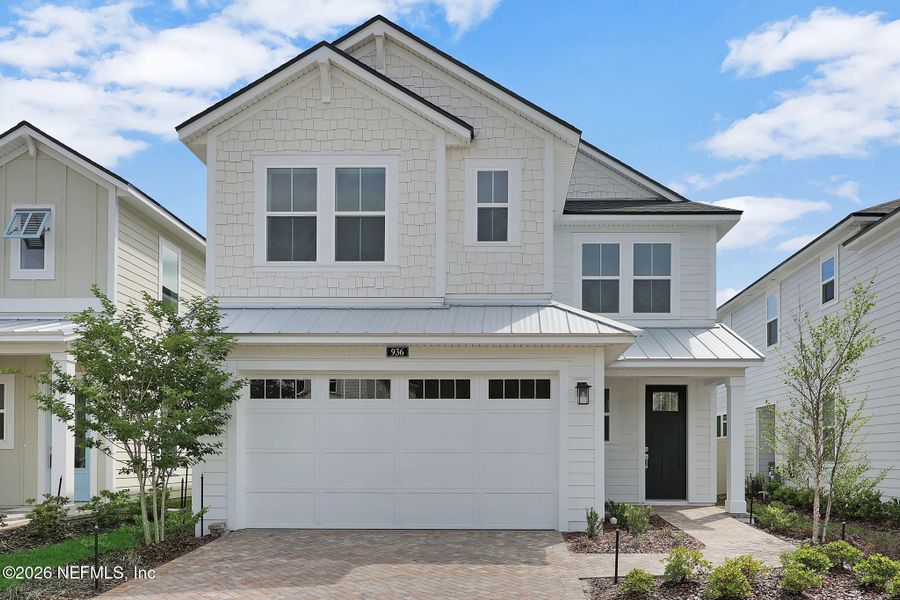 Front exterior of a new home in Seabrook Village at Seabrook, Nocatee, FL, highlighting curb appeal (Image 28).