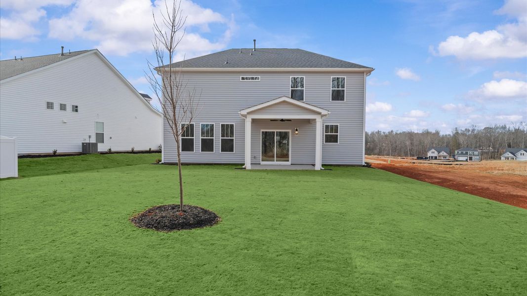 Exterior details and patio area of a home in Fox Hollow, Spartanburg (Image 3).