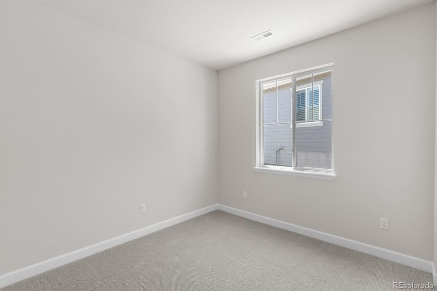 Spacious, unfurnished interior of a new home in Rhyolite Ranch, Castle Rock (Image 29).